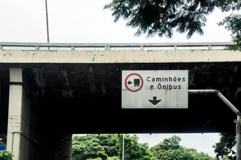 Bridge Sao Paulo Brazil sign post caminha onibus translation truck bus Stock Photos