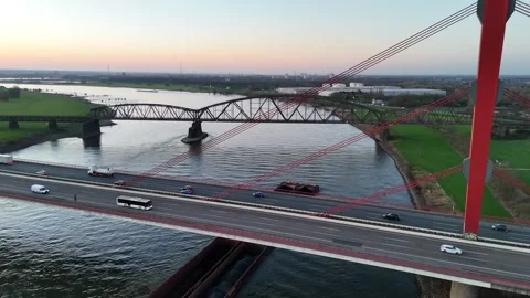Bridge side view with passing cargo ship below Video stock 331200892