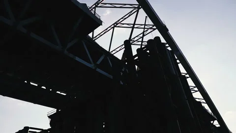 Bridge. Silhouette of a bridge on a sunset background. Video stock 115077123