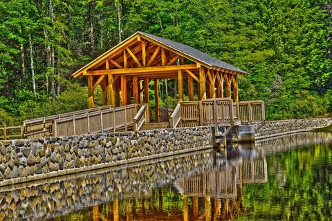 Bridge spanning the dam at eames pond Stock Photos