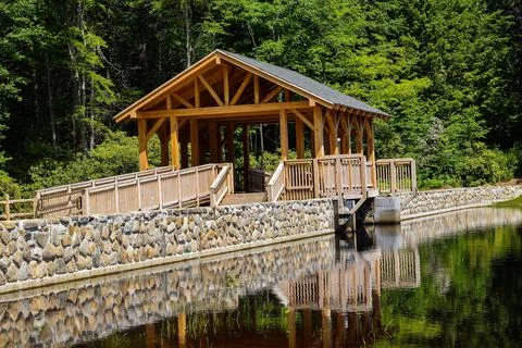 Bridge spanning the dam at eames pond Stock Photos