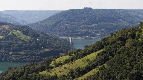 A bridge spanning a river between mountains. Goio-Ên. Uruguai river. Stock Footage 331827008