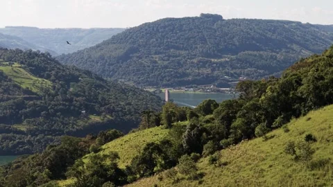 A bridge spanning a river between mountains. Goio-Ên. Uruguai river. Stock Footage 331827049