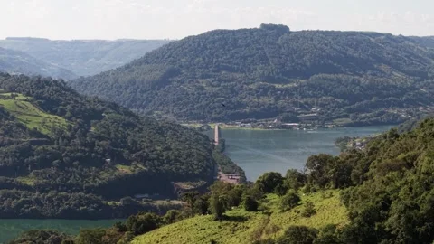 A bridge spanning a river between mountains. Goio-Ên. Uruguai river. Stock Footage 331827060
