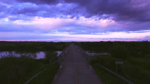Bridge spanning river in countryside Stock Footage 63307507