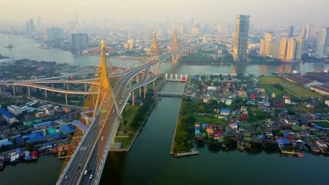 A bridge spans the chao phraya river in the bangkok cityscape Stock Footage 312432590