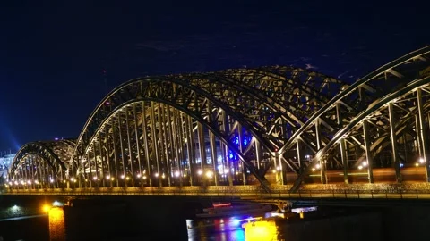 A bridge spans a river with a cathedral in the background Video stock 313582028