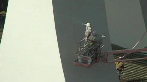 Bridge spray painters at column base Video stock 105553228