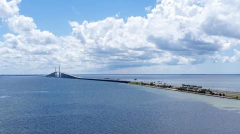 The bridge structural components and sandy beach make a great pit stop Stock Photos