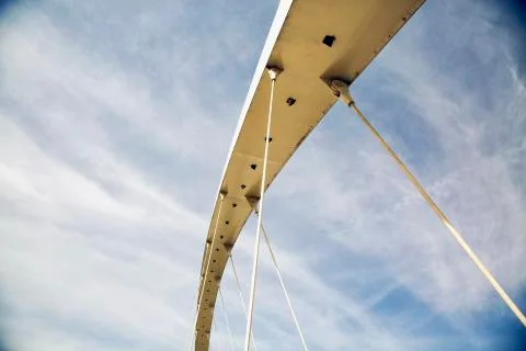 Bridge structure in blue cloudy sky Stock Photos