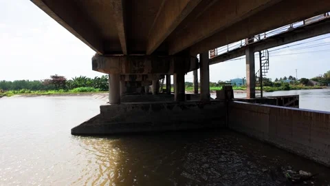 Bridge structure over water in Tra Vinh, Vietnam, showcasing local engineering Stock Footage 332064129