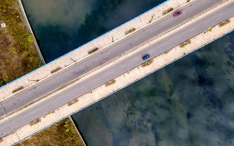 Bridge top high diagonal view blue river Stock Photos