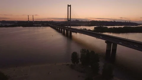 Bridge with trafic over the river at sunset aerial drone footage Stock Footage 85045916