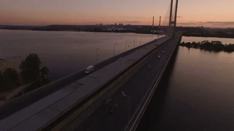Bridge with trafic over the river at sunset aerial drone footage Stock Footage 85050302