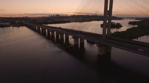 Bridge with trafic over the river at sunset aerial drone footage Stock Footage 85052446
