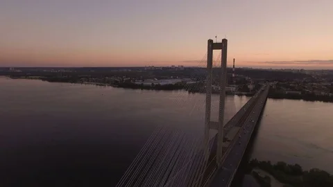 Bridge with trafic over the river at sunset aerial drone footage Stock Footage 85086728