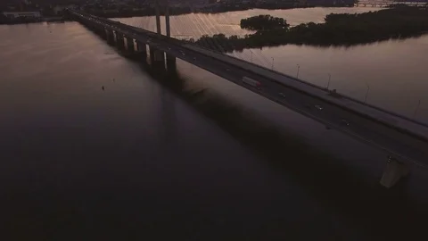 Bridge with trafic over the river at sunset aerial drone footage Stock Footage 85088688