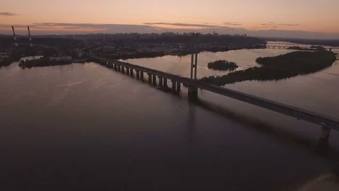 Bridge with trafic over the river at sunset aerial drone footage Stock Footage 85090918