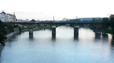 Bridge for train over the river - city with buildings - nature (trees) - without Stock Footage 41745318