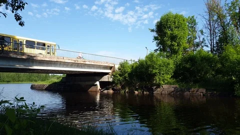 The bridge is transporting through the water channel. Road over the river. Stock Footage 108965409
