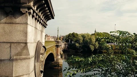 Bridge with tree branches gently swaying in the wind 動画素材 160437069