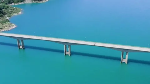 Bridge at turquoise lake. Stock Footage 201020387