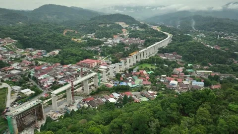 Bridge Under Construction in Gombak Area with Scenic Mountain Backdrop Stock Footage 320752360