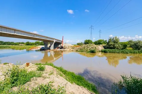 Bridge under construction over the river, concrete, construction site Stock Photos