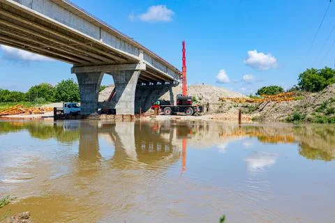 Bridge under construction over the river, concrete, construction site Stock Photos