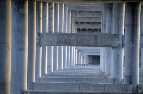 A bridge under structure of concrete pilars and beams Stock Photos