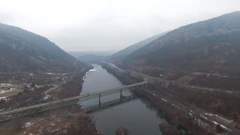 Bridge in valley with river Stock Footage 71697928