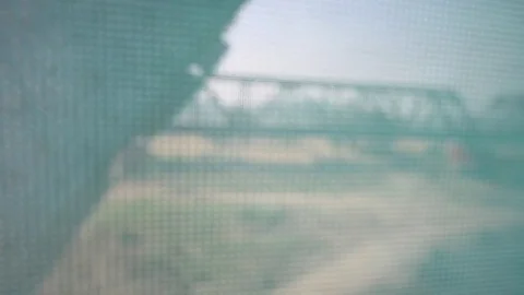 Bridge view from train window Stock Footage 77155949
