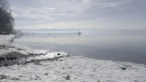 Bridge into the winter lake 스톡 동영상 75610227