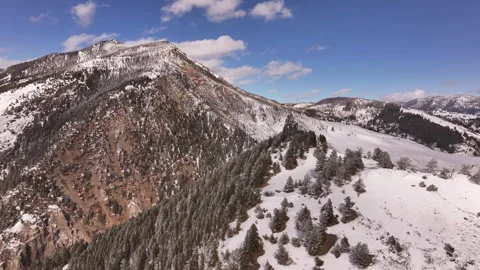 Bridger Mountain Range, Gallatin Valley, Bozeman, Montana Winter Aerial Stock Footage 303590041