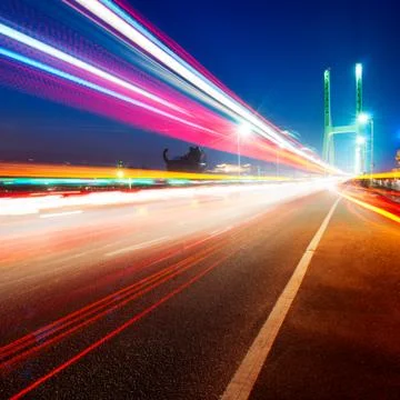 Bridges and light trails Stock Photos