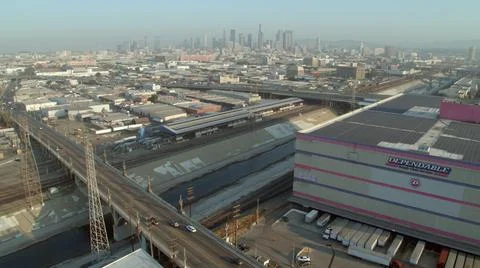 Bridges over Los Angeles river with Downtown skyline in the distance Stock Photos