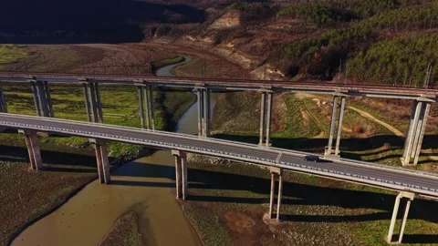 Bridges over river and valley in rural area during daylight hours 動画素材 336547141
