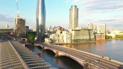 Bridges over Thames river, buildings illuminated by bright morning sun Stock-Footage 157442730