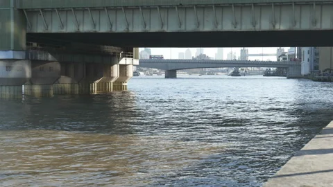Bridges seen from underneath another bridge on the Thames River. Stock Footage 169468720
