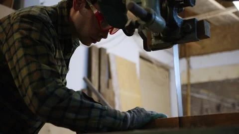 Bridging Two Worlds: The Farmer-Craftsman. Witness the artistry of a man in a Stock Footage 258566574
