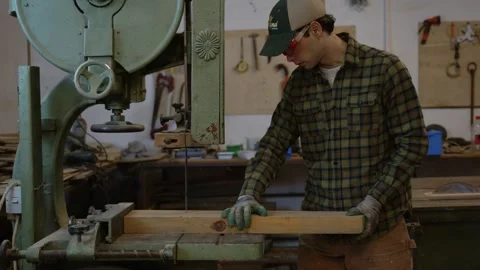 Bridging Two Worlds: The Farmer-Craftsman. Witness the artistry of a man in a Stock Footage 258567181