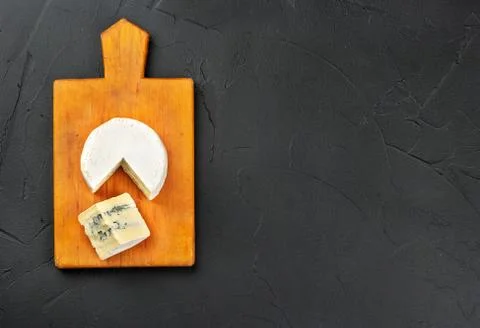 Brie cheese with slice Stock Photos