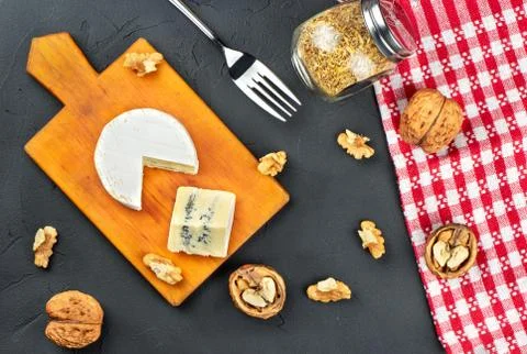 Brie cheese with slice Stock Photos