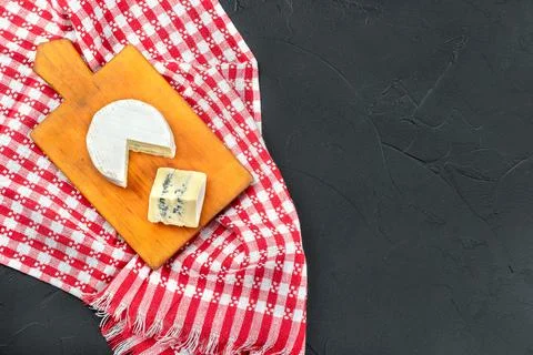 Brie cheese with slice Stock Photos