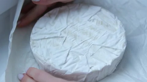 Brie cheese with white mold Round soft cheese white soft cheese with white mold Stock Footage 302105018
