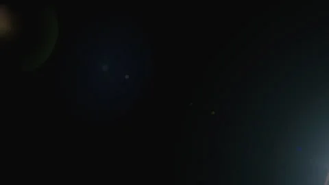 A brief light shines from the right in the darkness. 库存影片 314204664