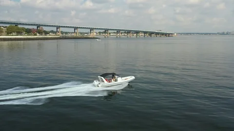 Brief tracking of a rigid-hulled inflatable boat Stock Footage 114243547