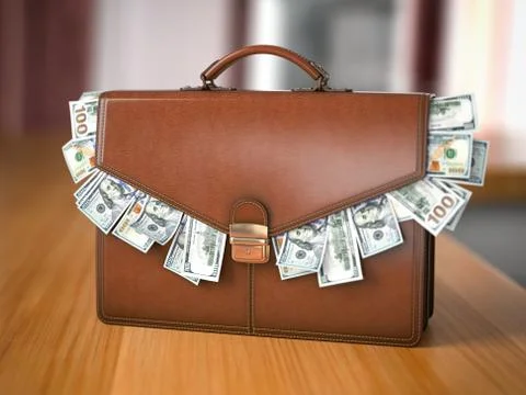 Briefcase full of dollars isolated on the table. Bribery, corruption, stock e Illustrazione stock