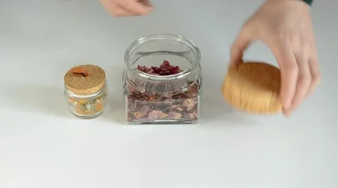 Brier blow tea on the table and glass jar Stock Footage 10819267