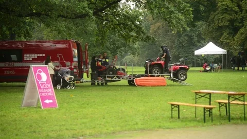 The Brigade of Firefighters Driver moves on ATV Quadricycle on a Trailer Stock Footage 80226343